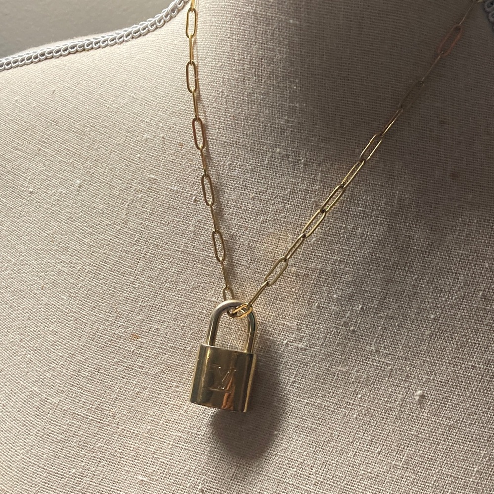 2pc Louis Vuitton authentic Lock with unbranded Stainless steel gold necklace.